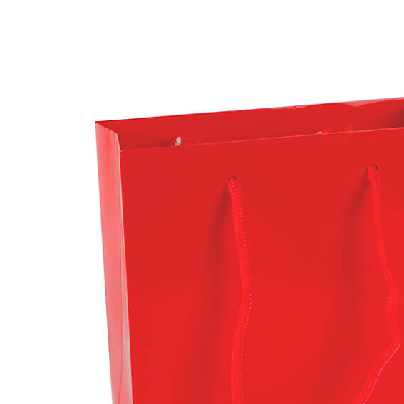 Petites pochettes cadeaux papier glacé rouge, petit sachet papier.